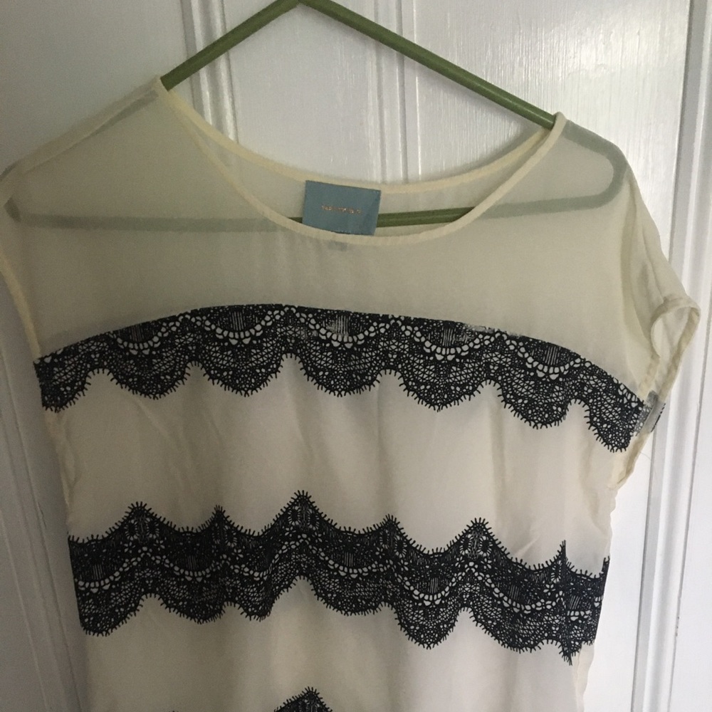 Elegant off white with black lace top!